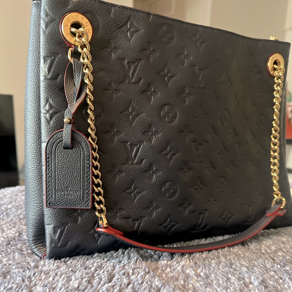 Monogram Empriente - A gorgeous statement piece for the career person.